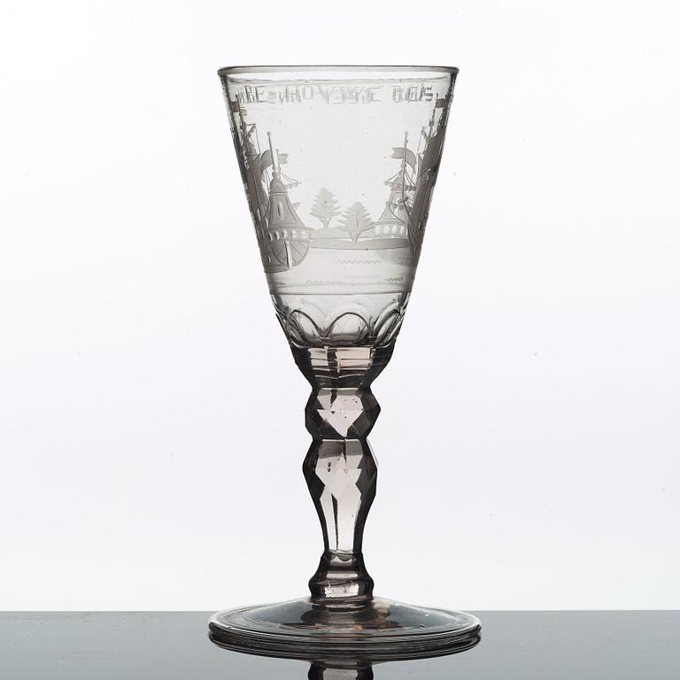 A Dutch cut and engraved wine glass, 18th Century.