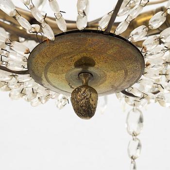 An Empire-style six-light chandelier, circa 1900.