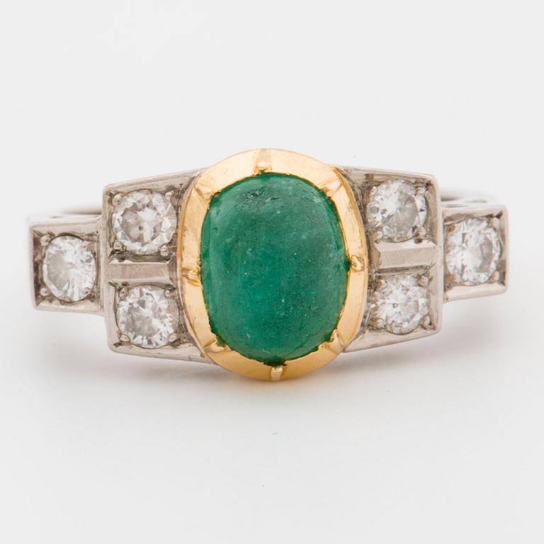 Ring with cabochon-cut emerald and brilliant-cut diamonds 0.60 cts.