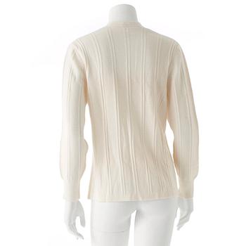 CÉLINE, a white wool cardigan.