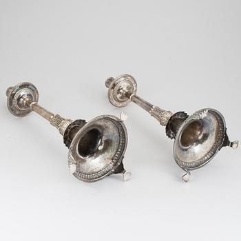 A pair of silver empire candlesticks by Aldolf Zethelius, Stockholm 1821 & 1824. 1284 g.