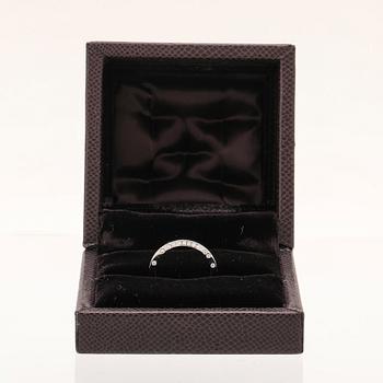 A “Divine Rita” ring 950 platinum and brilliant cut diamonds by Boucheron.