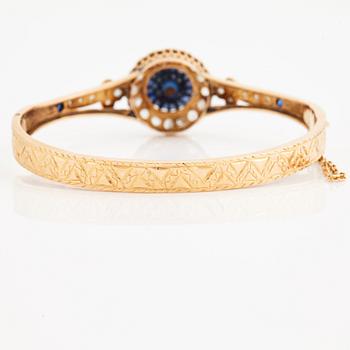 A blue paste and rose cut bangle, 19th century.