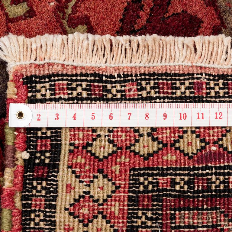 An antique Agra carpet of 'Timuri Baluch' design, Northern India, c. 265 x 181 cm.