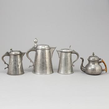 THREE PEWTER JUGS AND A TEAPOT, 19th century.