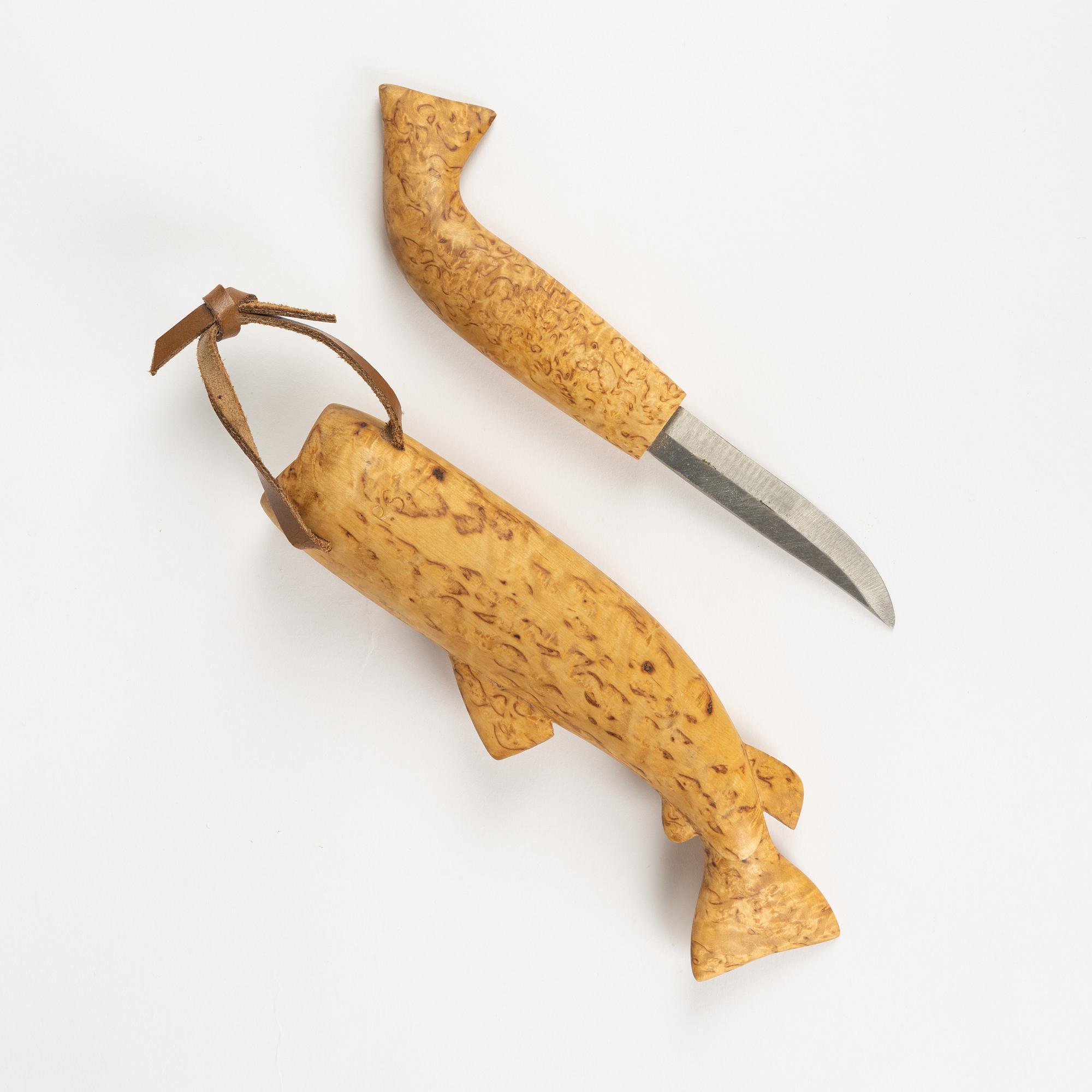 A burr birch knife, unidentified signature.