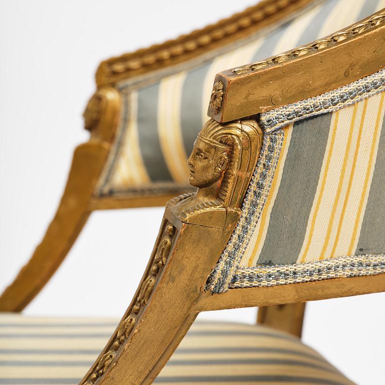 A pair of late Gustavian open armchairs attributed to E. Ståhl (master in Stockholm 1794-1820).