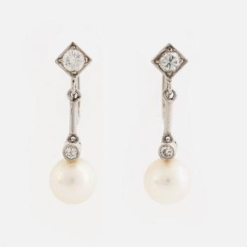 Cultured pearl and diamond earrings.
