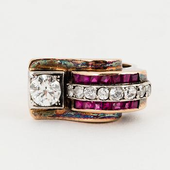 RING, Art déco, 18K gold with a diamond approx 0.65 cts, small diamonds 8/8 approx 0.40 cts and small rubies.