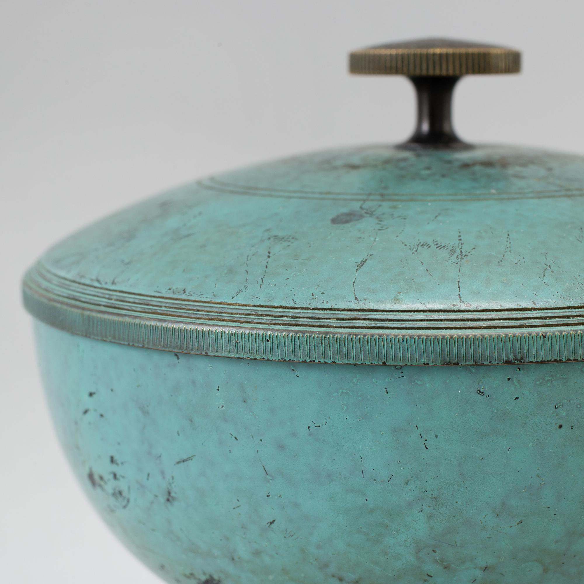 NILS FOUGSTEDT, An early 20th century patinated bronze bowl with cover by Nils Fougstedt.