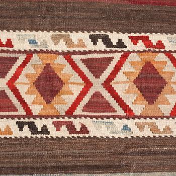 A kelim rug, ca 300 x 208 cm.