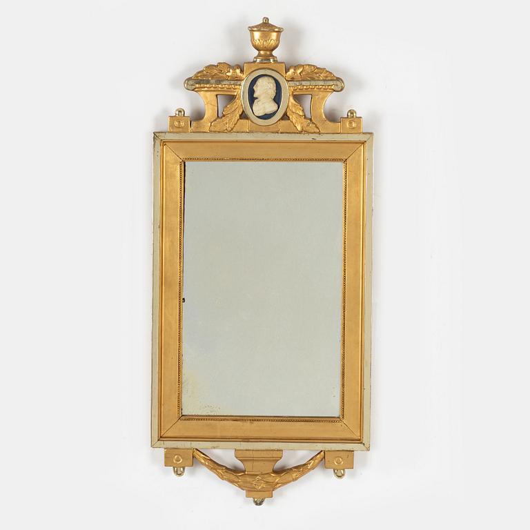A Gustavian style mirror, circa 1900.