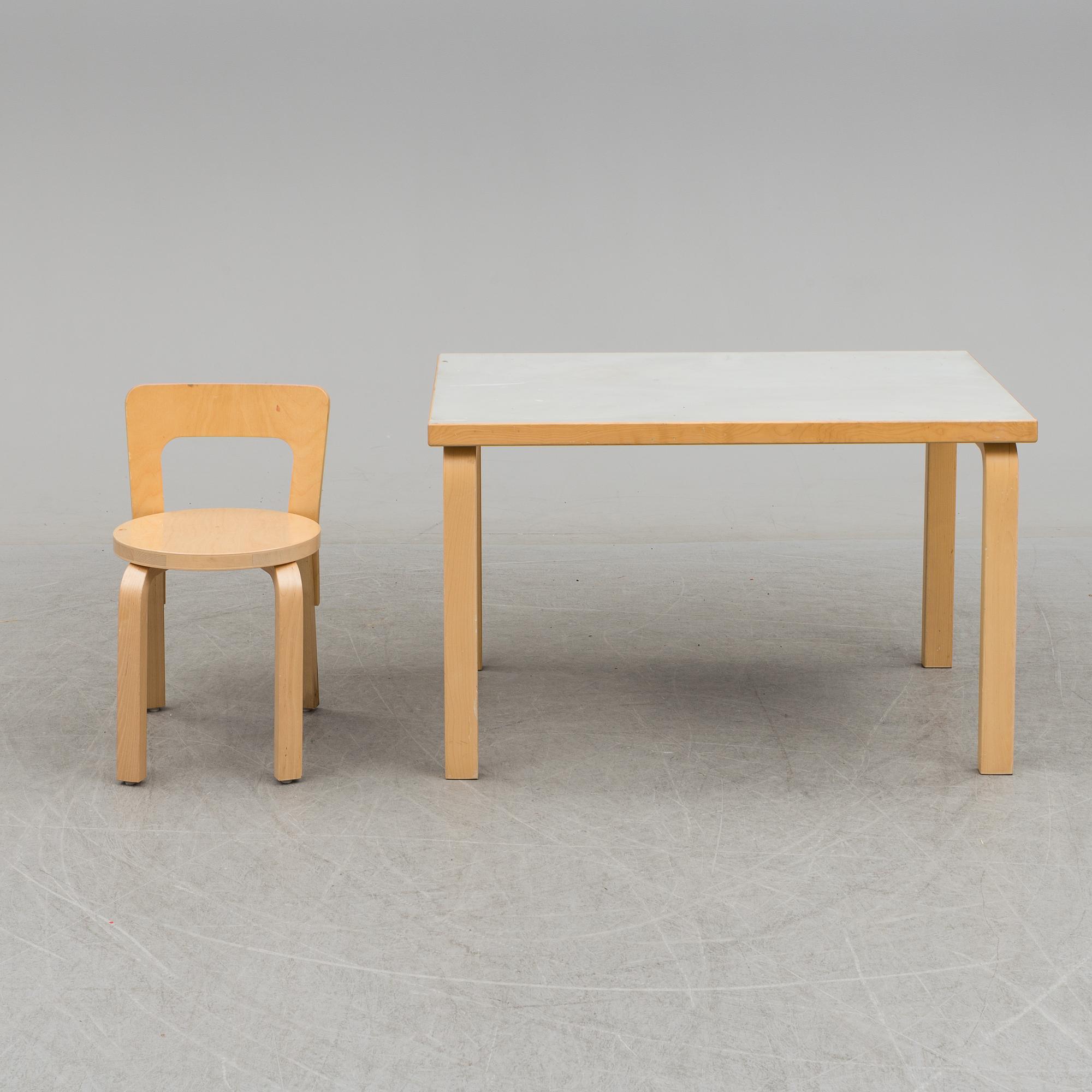 ALVAR AALTO, table and chair. Late 1900s / early 21th century.