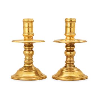 522. A pair of presumably Dutch colonial candlesticks.