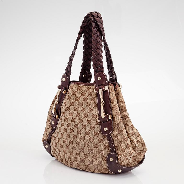 Gucci, a monogram 'Pelham' canvas and leather bag.