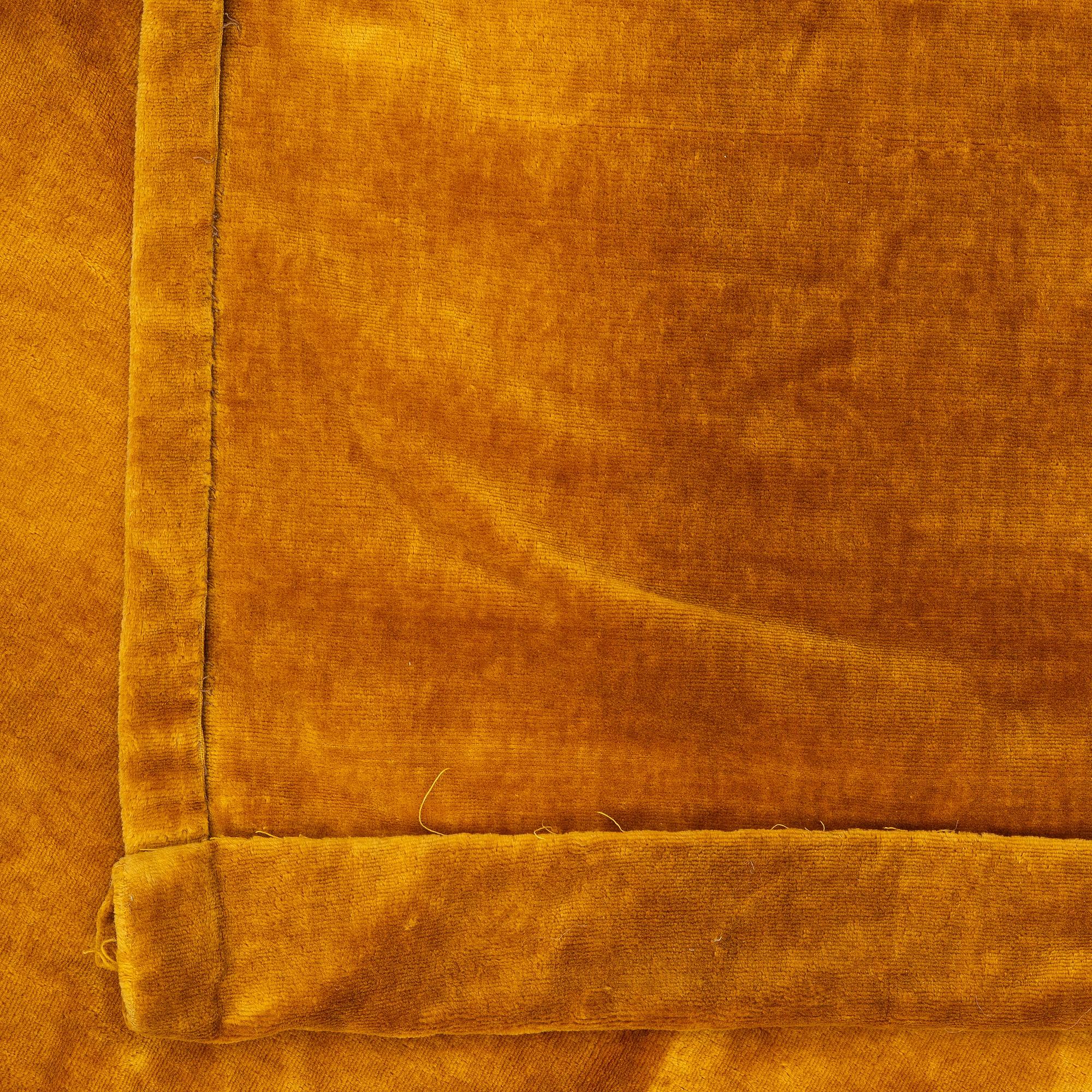 A set of four yellow velvet curtains, 1910's/20's, ca 247 x 120 cm.