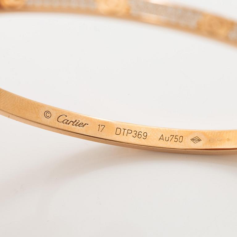 A Cartier bangle "Love" 18K rose gold with round brilliant-cut diamonds.