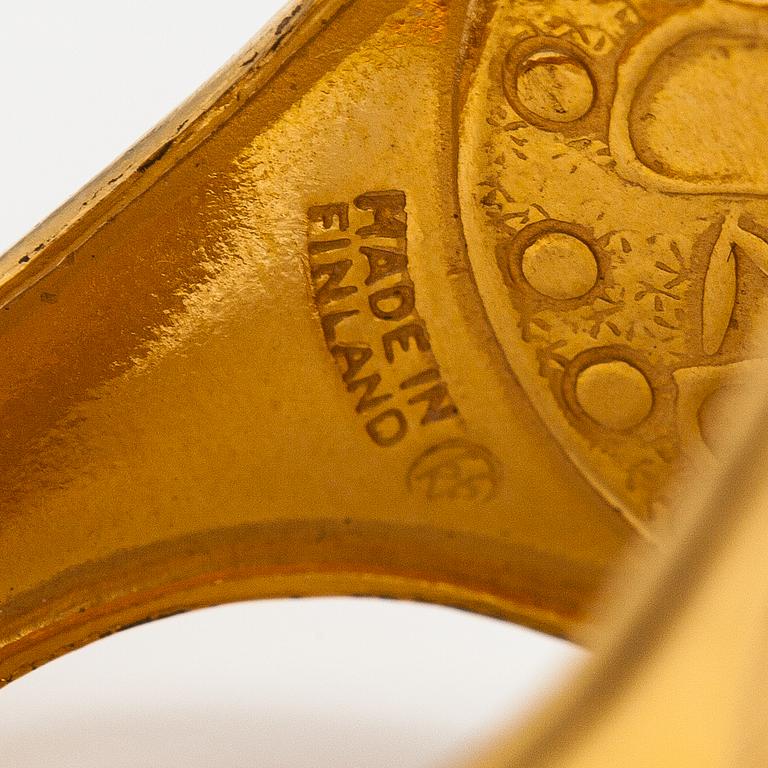 A gold plated bronze ring "Perniö-ring", model 111. Kalevala Koru, Helsinki.