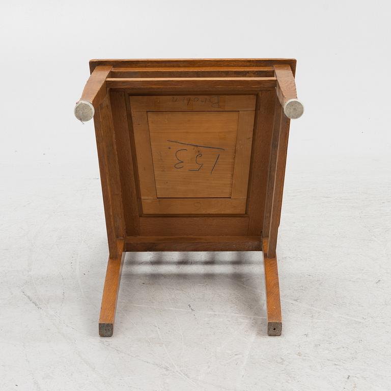 An oak writngdesk with a chair from Åtvidabergs, first part of the 20th century.