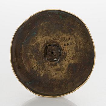 An early 19th century French Empire candlestick.