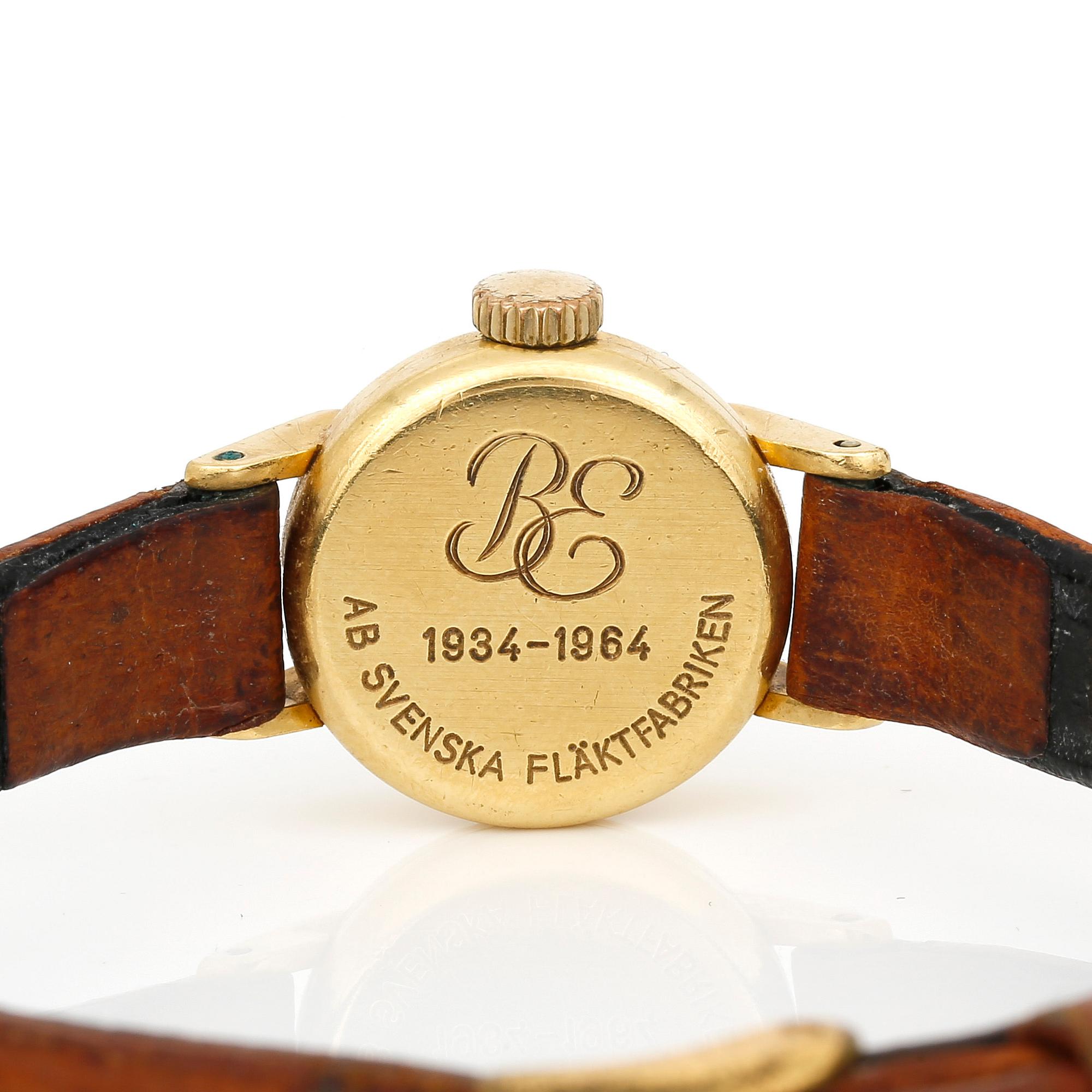 ARMBANDSUR, minst 18K guld, Omega, 1900-talets andra hälft.