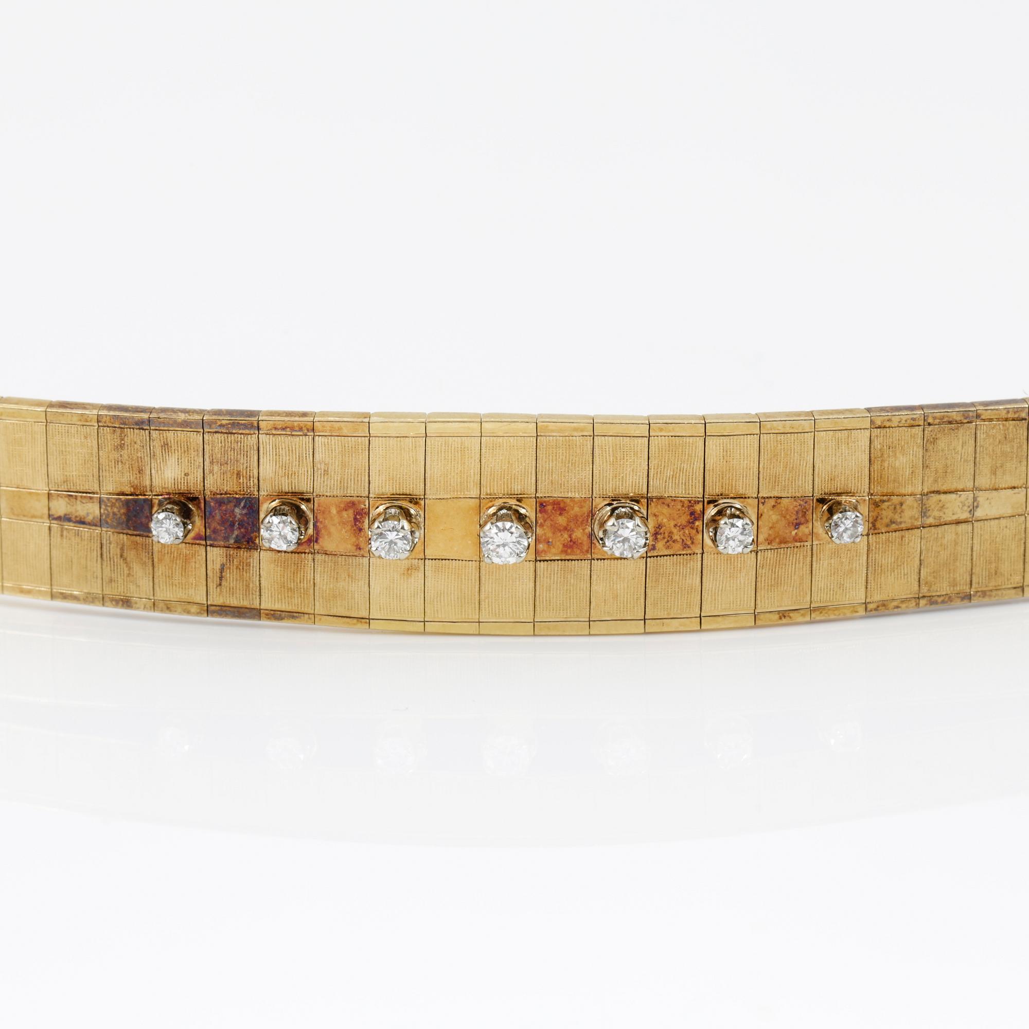 ARMBAND, guld 18K, sju små diamanter, stämplad CB, Europa 1900-talets andra hälft. Vikt ca 40 gram.