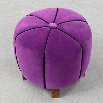 A 1940's table with pouf.