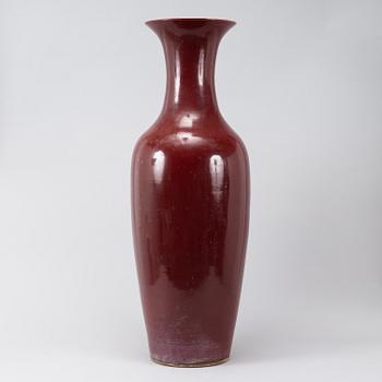 A massive red Chinese porcelain floor vase, modern production.