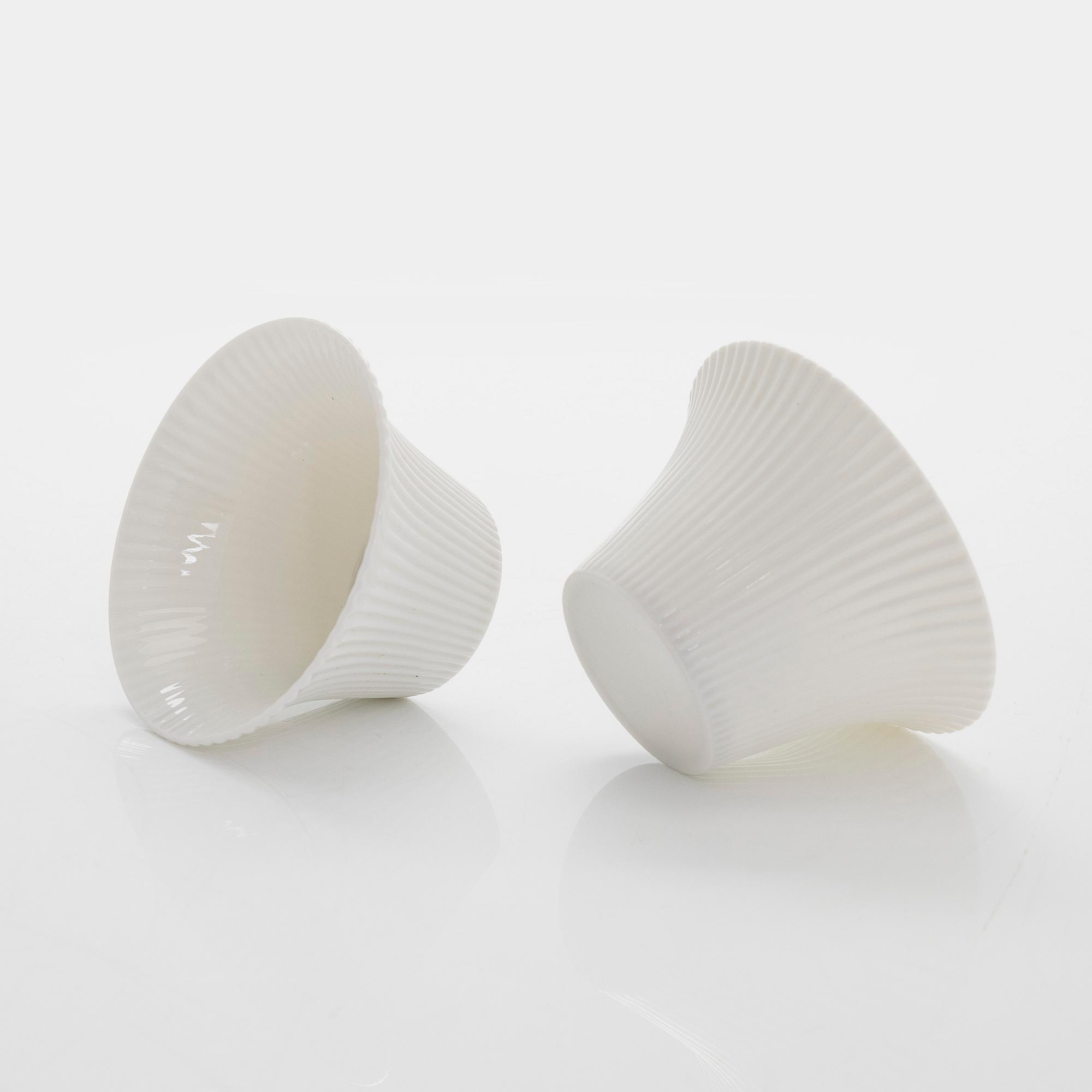 Aune Siimes, twelve porcelain custard cups signed AS ARABIA, 1950s/60s.