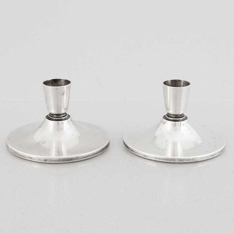 A pair of Swedish silver candlesticks, marks of Atelier Borgila, Stockholm 1963.