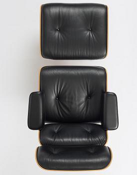 Charles & Ray Eames, an "Eames Lounge Chair" with ottoman, Vitra, 2000s.