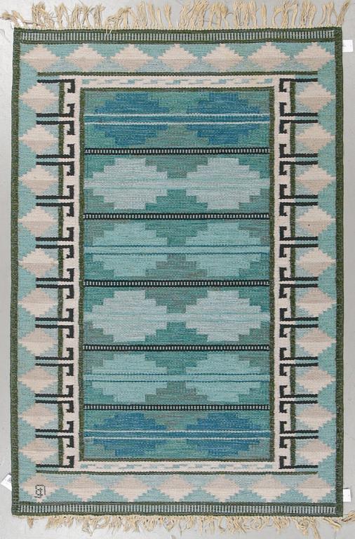 A carpet, flat weave, ca 203,5 x 138,5 cm, indistinct signature.