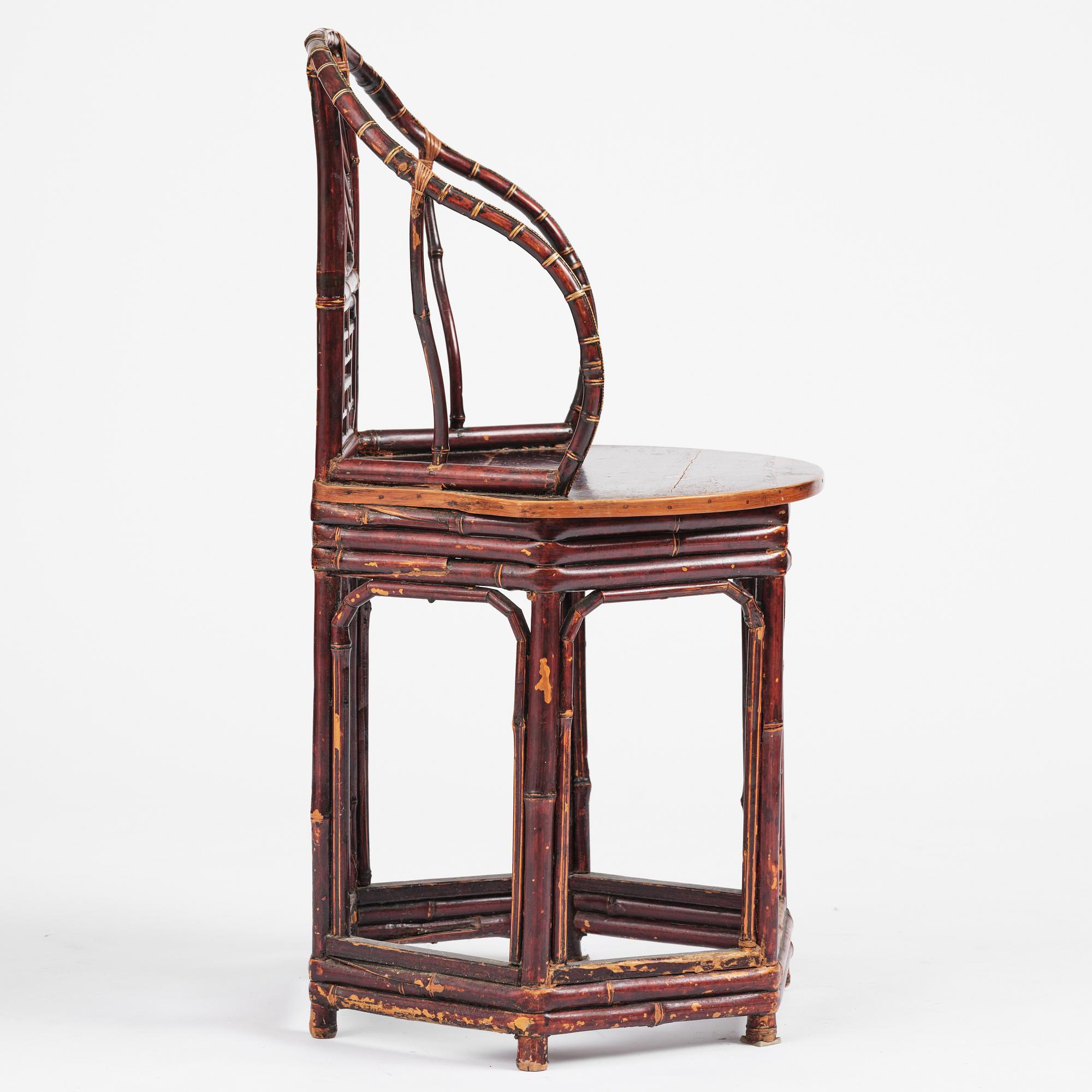 A Chinese bamboo horseshoeback armchair, late Qing dynasty.