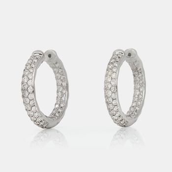 A pair of loop diamond earrings, 2.58 cts in total, according to engraving.