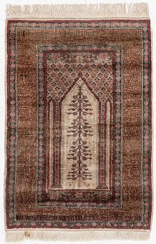 A Kaiseri prayer rug, c. 135 x 90 cm.