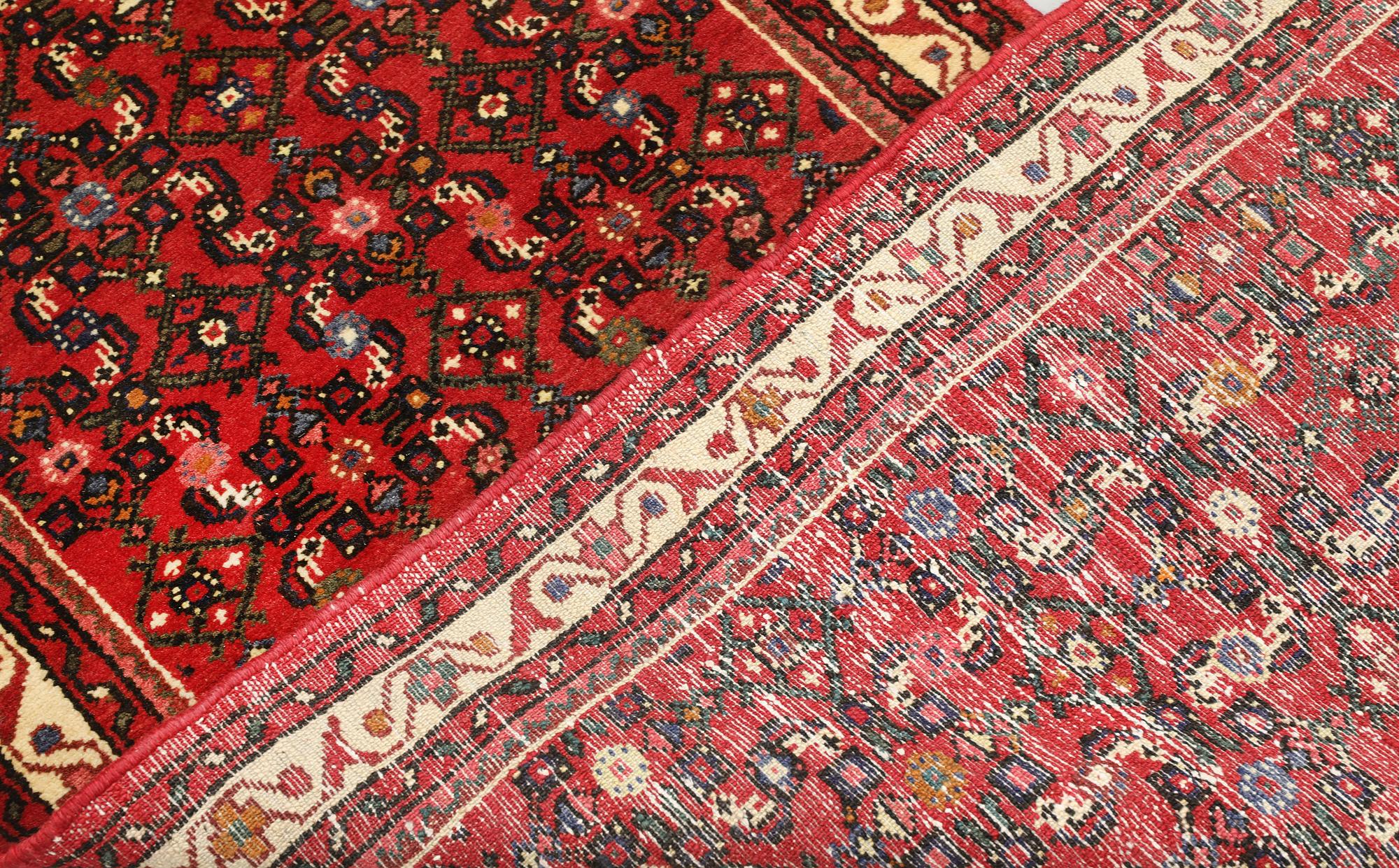 A Hosseinabad runner, c. 386 x 81 cm.