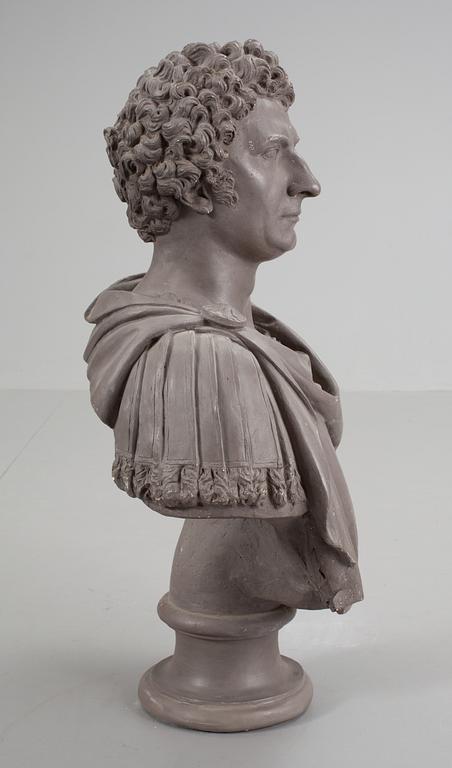 A Swedish Empire plaster bust representing King Karl XIV Johan.