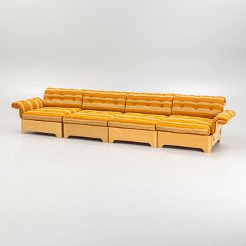 A module sofa and a coffee table, 1970's.