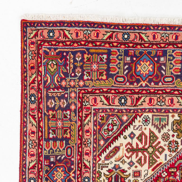 A Tabriz carpet, c. 300 x 200 cm.
