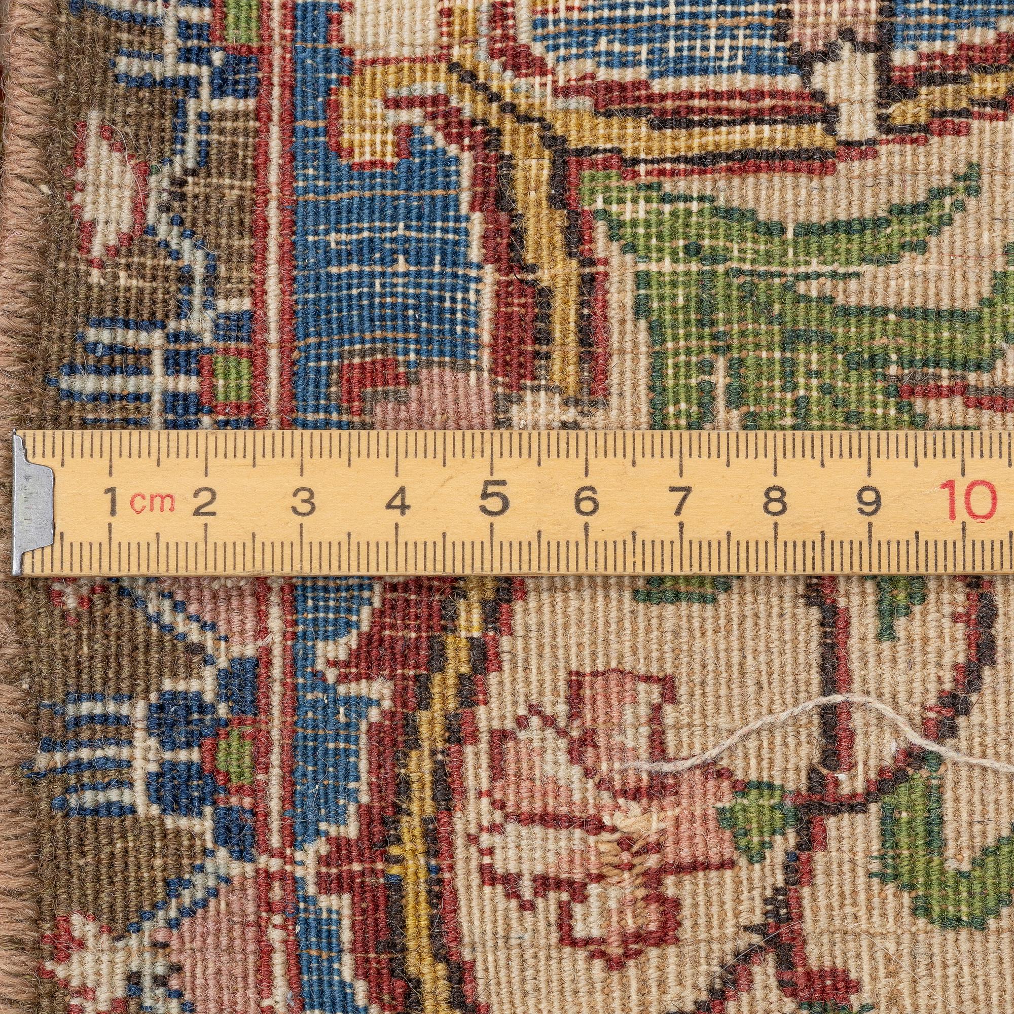 A semi-antique Tabriz carpet, West Persian, c. 250 x 175 cm.