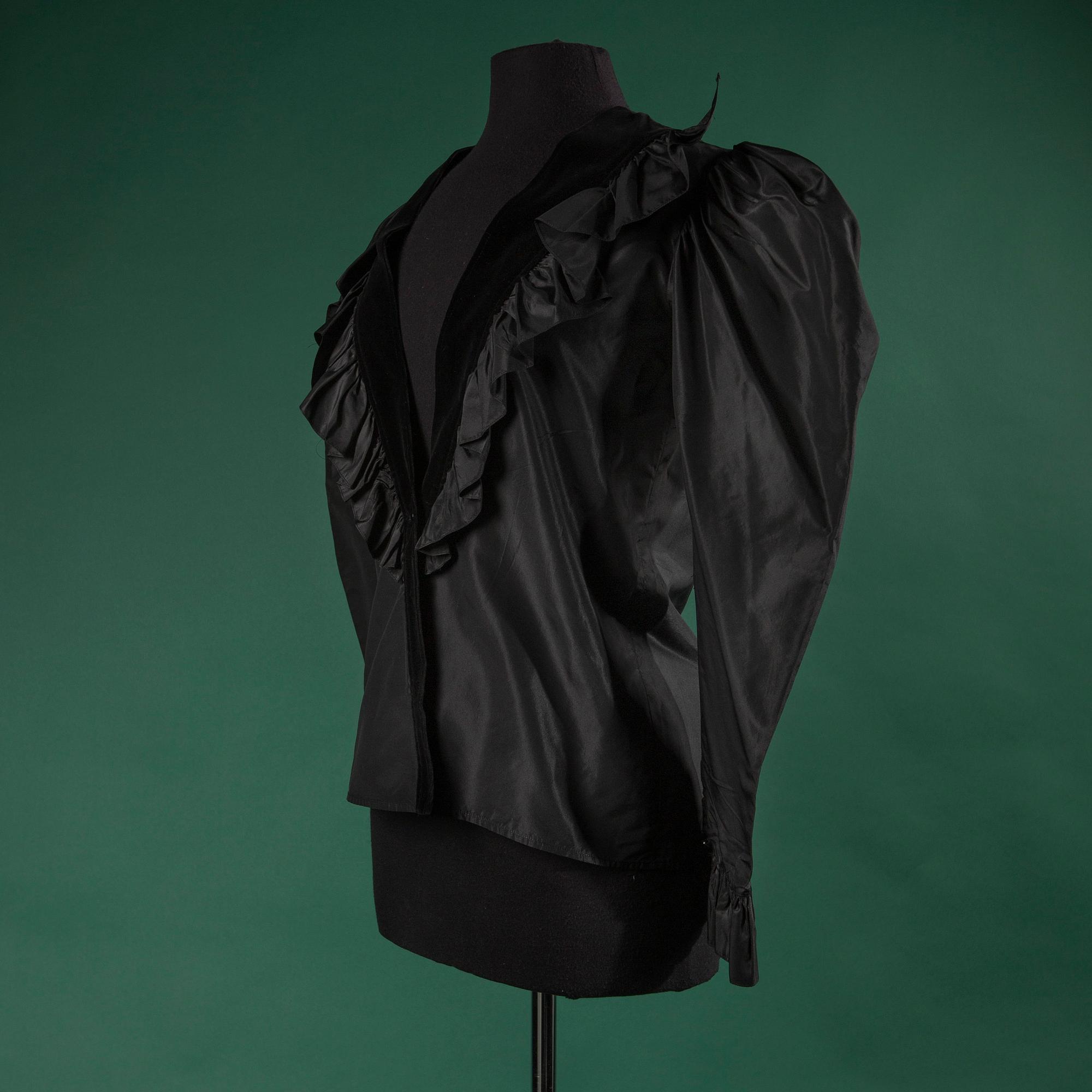 A blouse by YVES SAINT LAURENT.