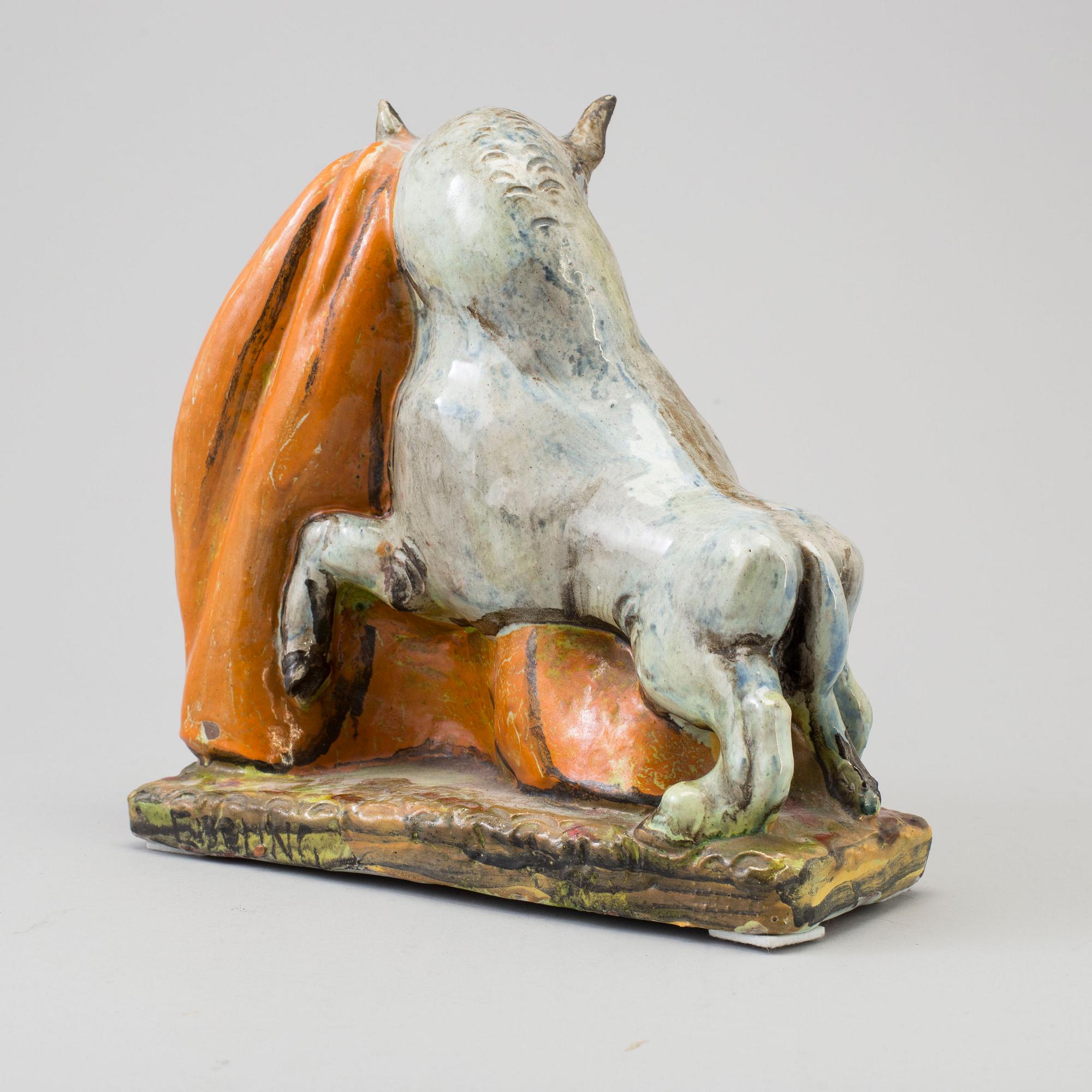 ALLAN EBELING, a pottery figure, signed Ebeling.