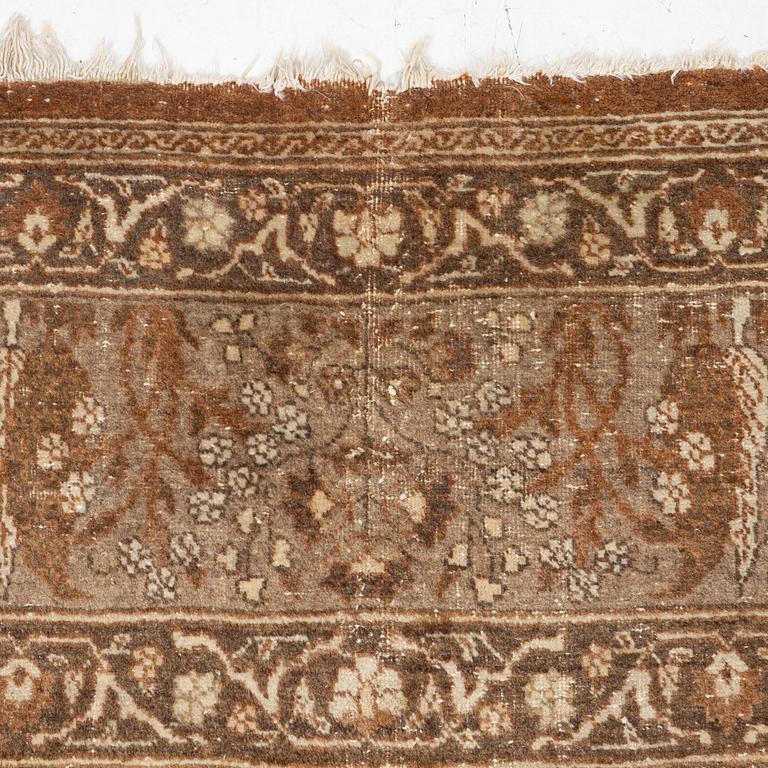 An antique Tabriz carpet, Northwest Persia, 453 x 310 cm.