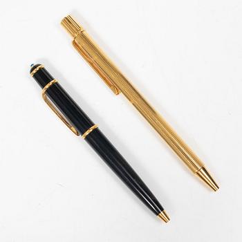 Cartier, Two ballpoint pens, 'must de Cartier' and 'Diabolo de Cartier'.