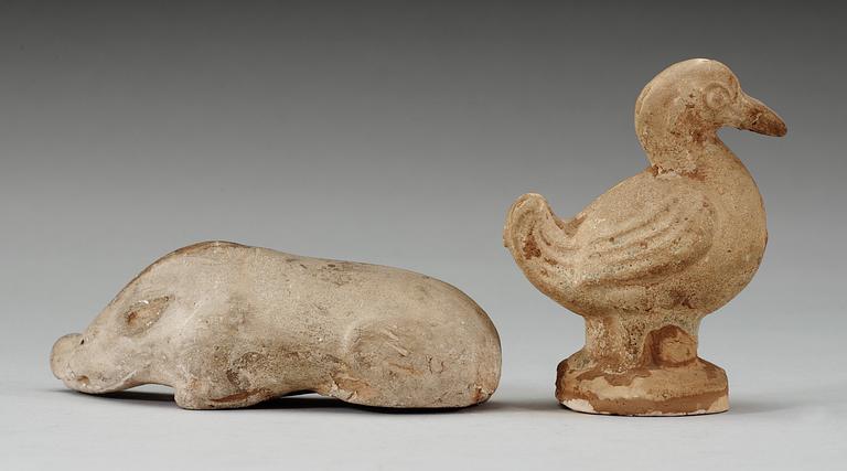 A potted figure of a duck and a wild boar, Tang dynasty (618-907).