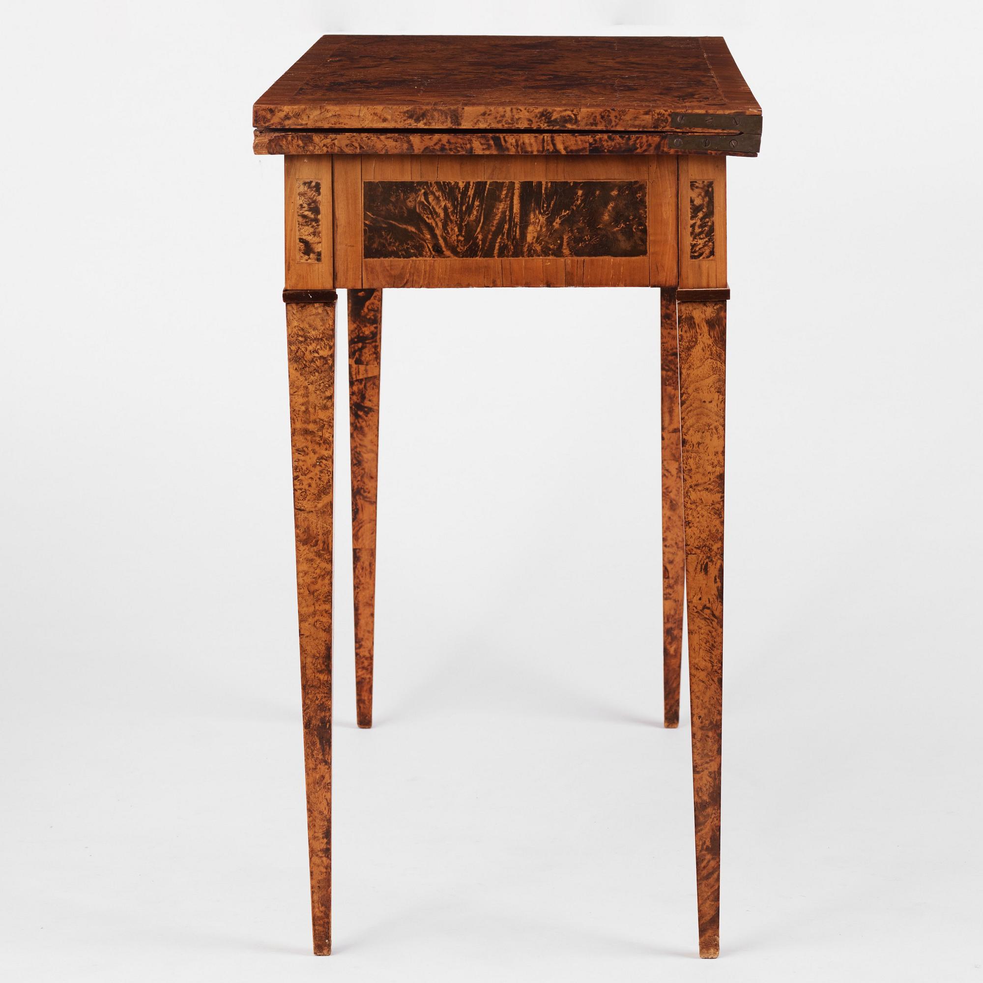 A late Gustavian burr-alder cards table, Mälardalen, late 18th century.