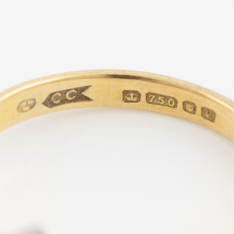 Ring, 18K gold with sapphire and brilliant-cut diamonds.