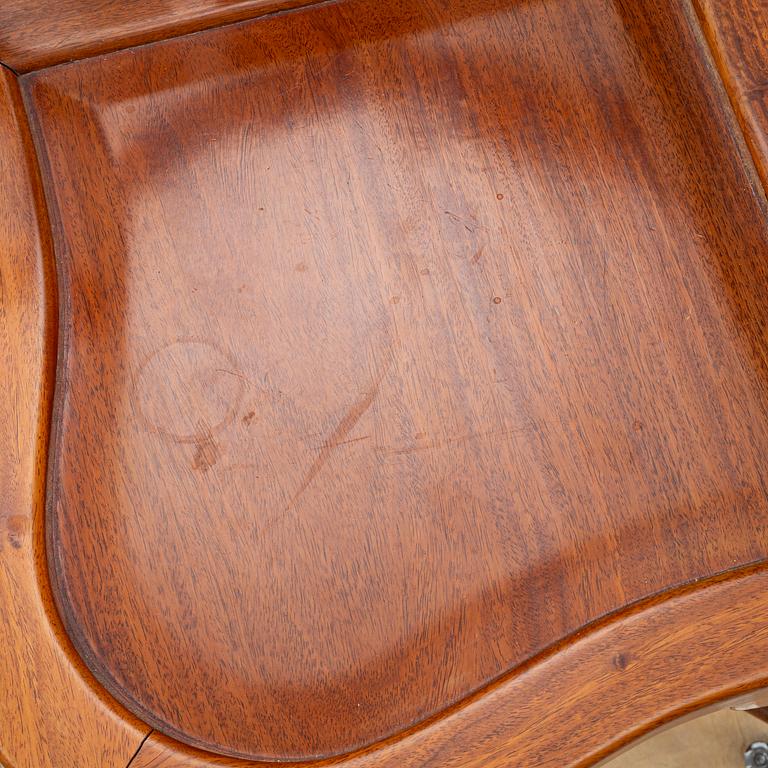 A Chinese hardwood corner armchair, 1900s.