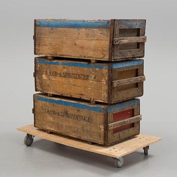 Three mid 1900s wooden boxes.