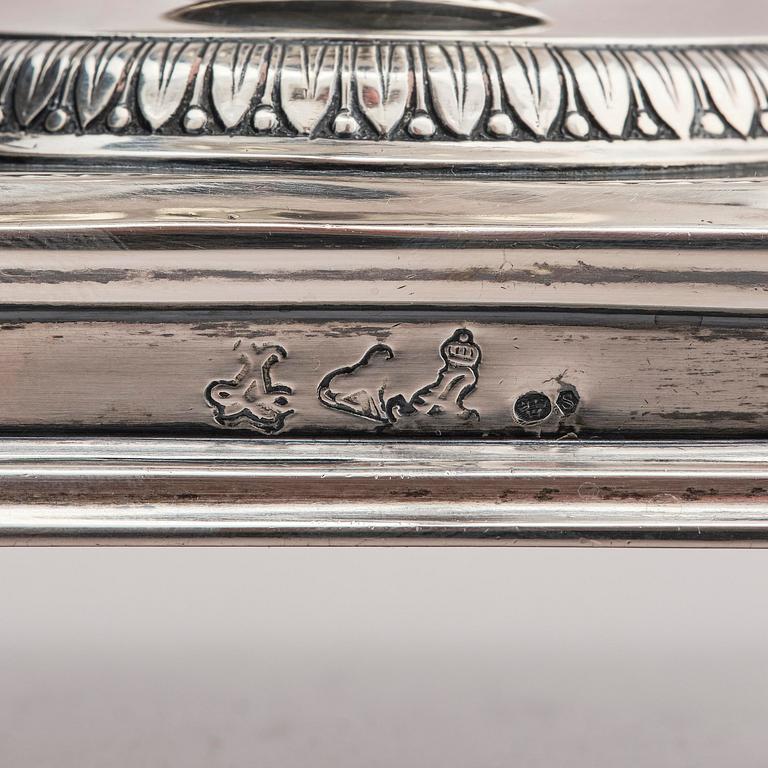 Lockurna, silver med blå glasinsats, Frankrike 1800-talets början.